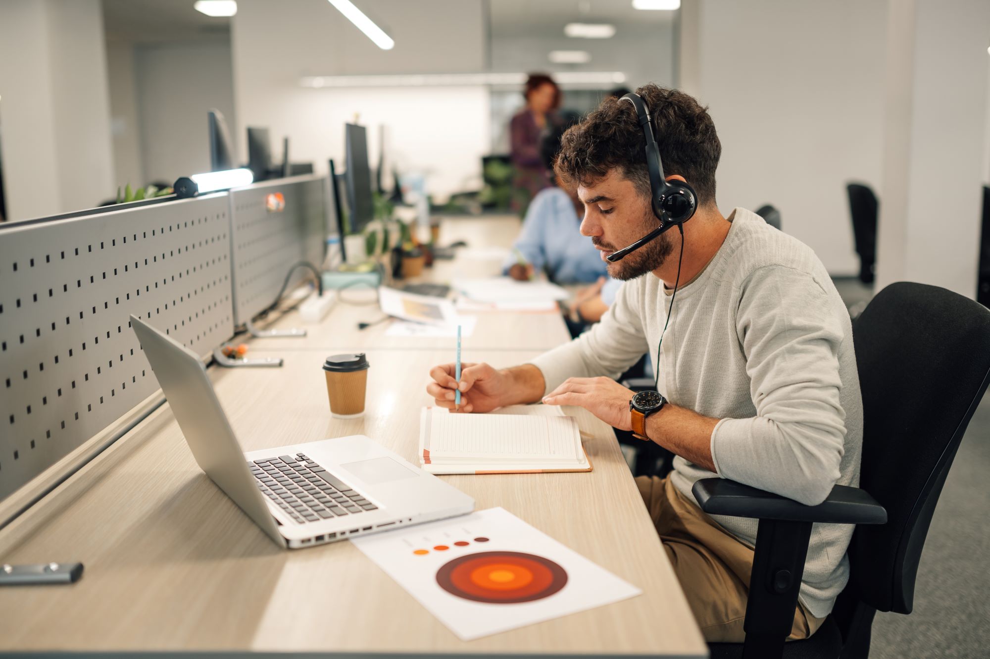 Customer support representative wearing a headset